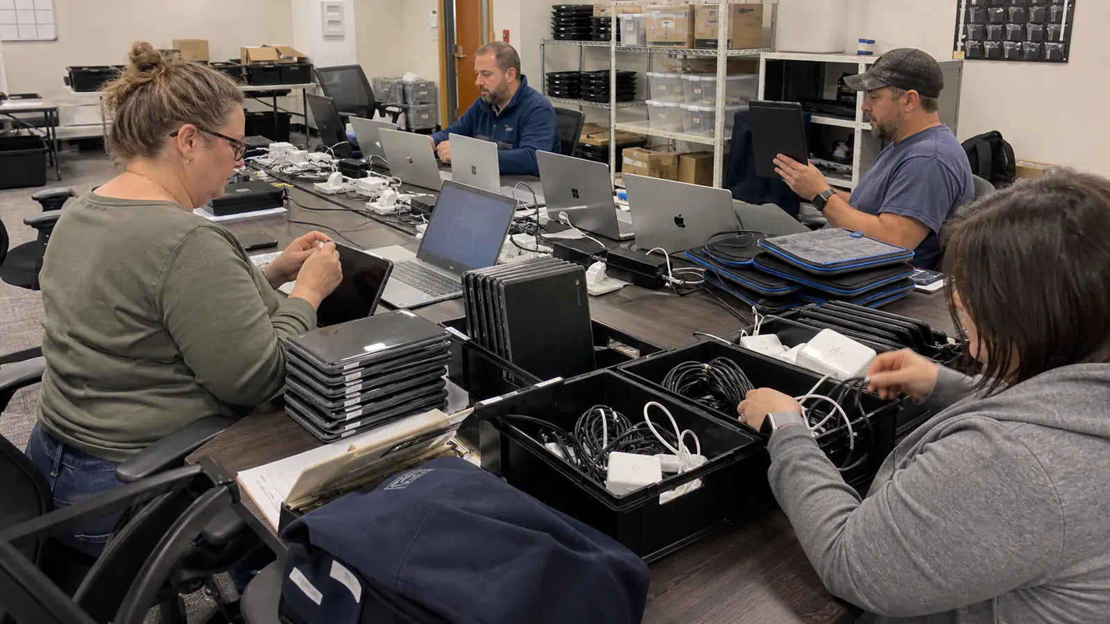 CTI team tagging, configuring, and staging devices for deployment